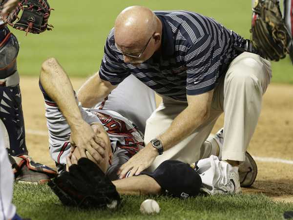 Tim Hudson is out for the year after breaking his ankle Wednesday night on a play at first base.